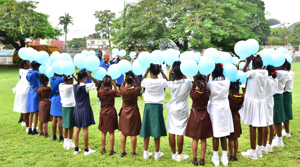 Students of the Belmont St Francois Girls RC School form the Blue Circle.
